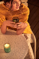 Ashley & Co | Tui & Kahili Outdoor Edition Scented Candle | Scent Lounge | Blue Glass Candle Lifestyle Image